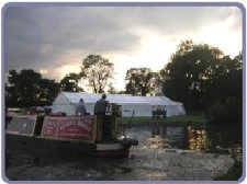 Scene at dusk as Ray Bowen arrives by boat