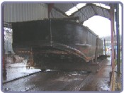 Butty on slip: Bow of has a fin or keel